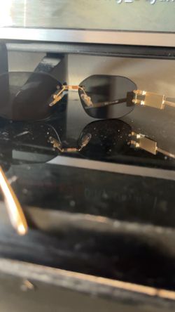 Versace tinted sun glasses