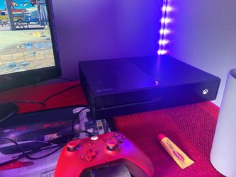 Xbox with monitor and a tv