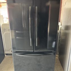 Black Whirlpool Refrigerator And Freezer
