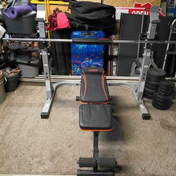 Squat rack, bench, barbell, weights