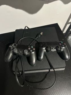 PS4 Slim + 2 controllers - good condition
