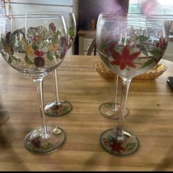 Nice Tall Pretty Wine Glasses  With Pretty Flowers Holly Berries Each Is Diffren