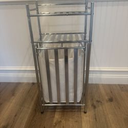 Laundry hamper/shelving unit
