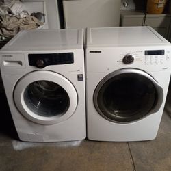 Dual Samsung washer and dryer matching gas.