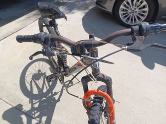 Black And Orange Monngose Mountain Bike