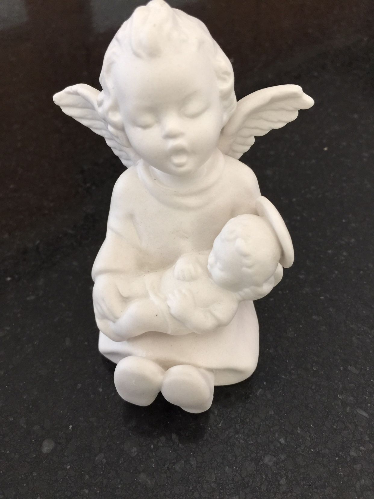 Goebel Figurine Of W. Germany Angel Holding The Christ Child