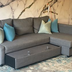 Gray Sectional Couch With Storage and Pull Out Bed