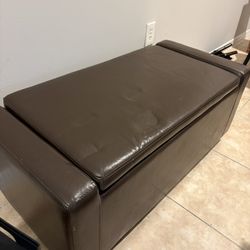 Brown leather ottoman with storage