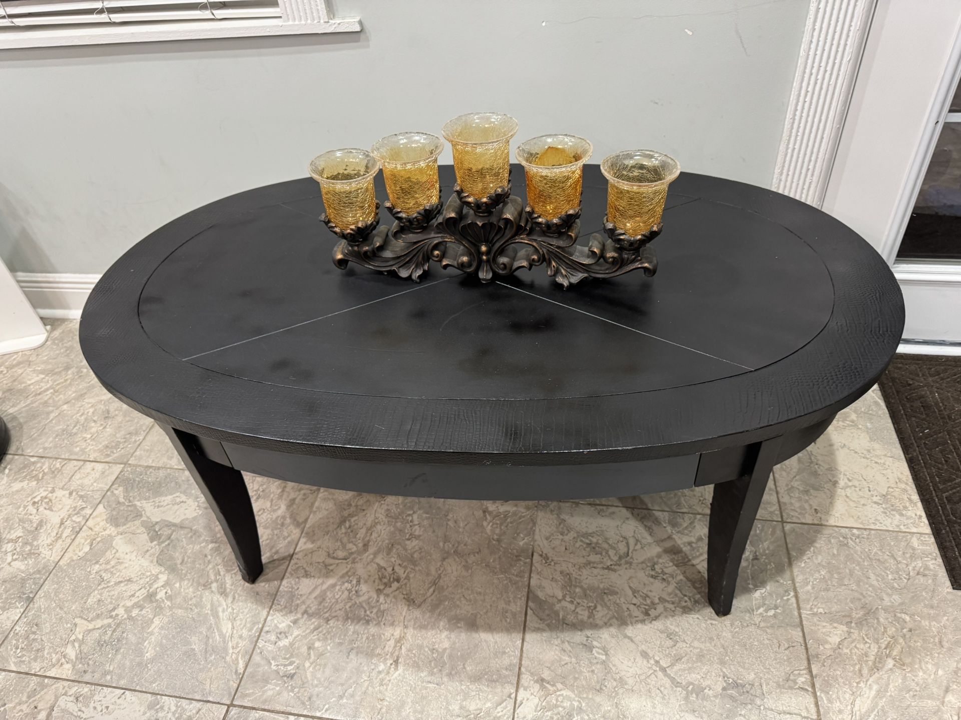 Sturdy Wood black oval Table  L-51” W-30” H-20”