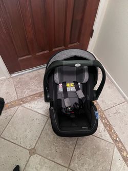 Graco SnugFit SnugRide 35 Elite Infant Car Seat and Stroller