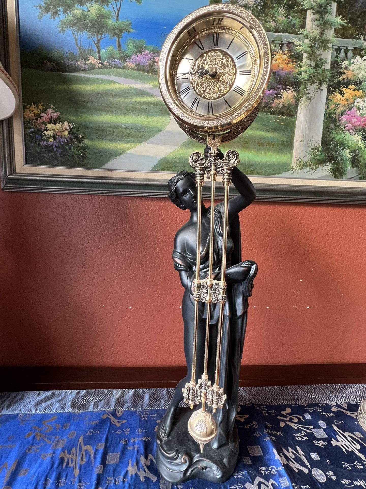 pendulum clock with Greek goddess