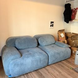 two piece blue couch