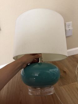 Modern table lamp with a teal glass body and a clear acrylic base for Desk Nightstand Bureau