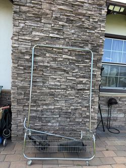 Rolling Clothing Rack with Storage Basket – $15