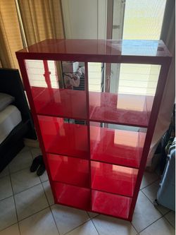 Red shelf organizer for shoes or books or clothes