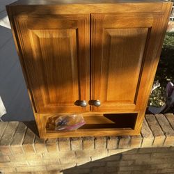 Bathroom cabinet with hardware.