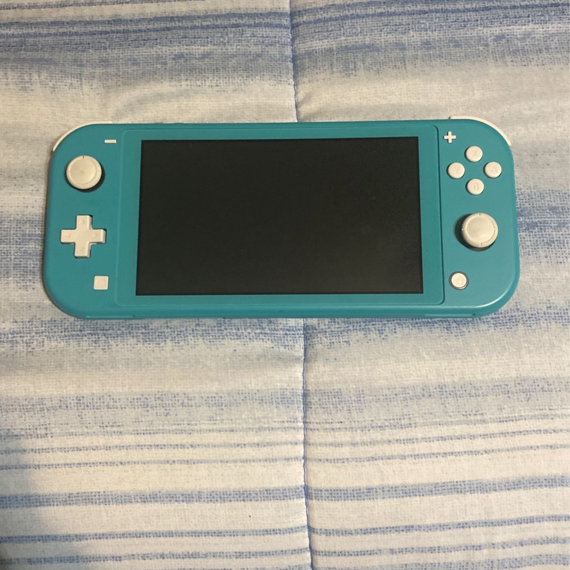 Nintendo Switch Lite (Very lightly used)