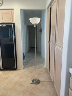 Brushed nickel torch floor lamp