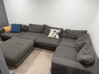 Free sectional sofa with ottoman