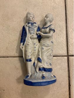Porcelain couple figurines