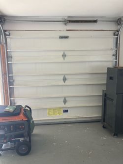 Garage door manual opener