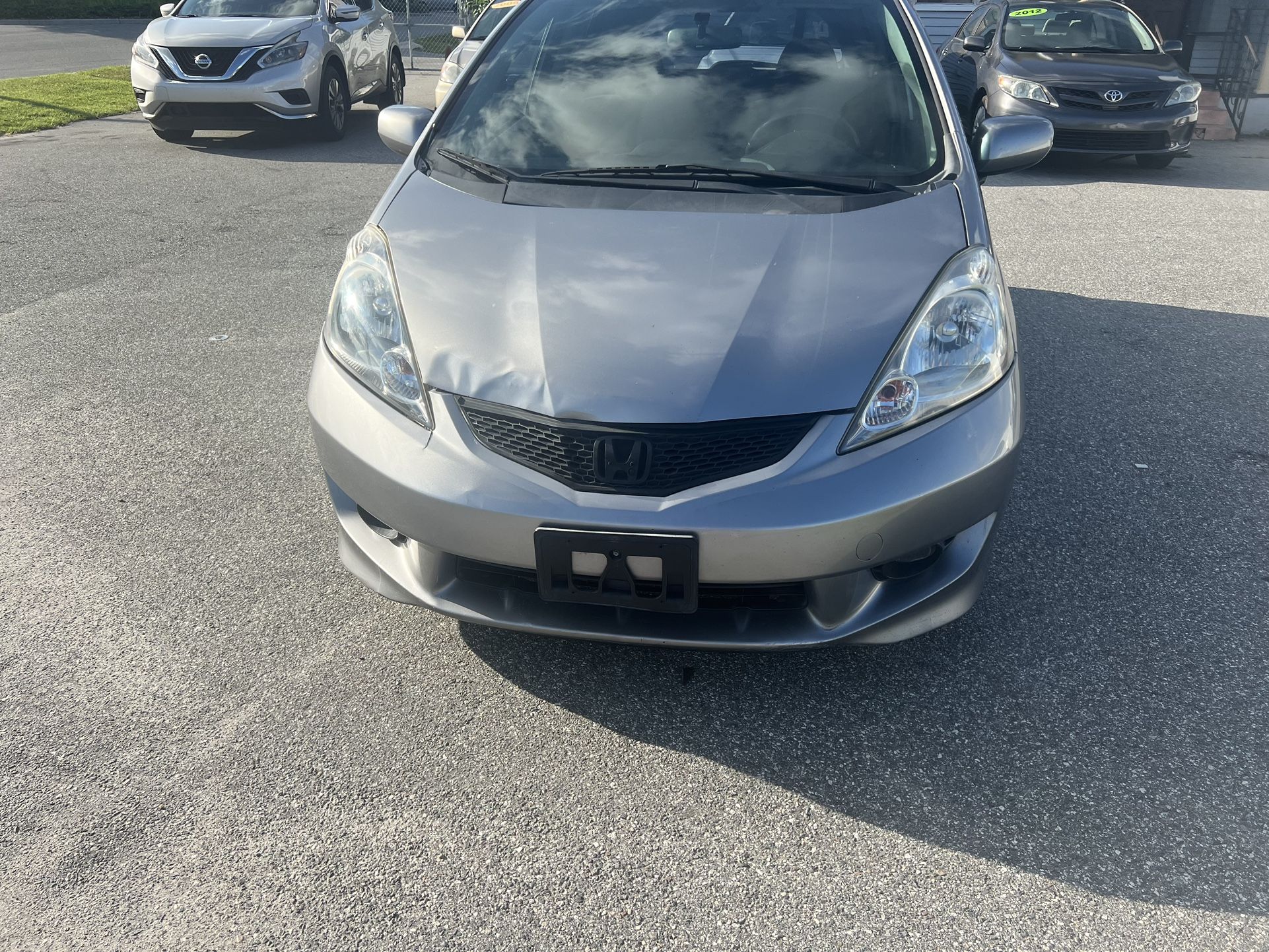 2 O O 9 HONDA FIT. $1,800 DOWN PAYMENT