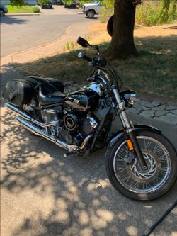 2006 Yamaha vstar 650 and Harley Davidson motorcycle helmet