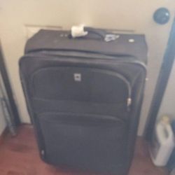 Very nice travel luggage with wheels Delsey brand great shape
