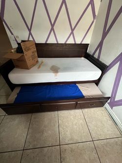 TV Vizio y cama
