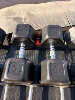 Pair of 65  pounds Nike hex rubber coated dumbbells in good condition