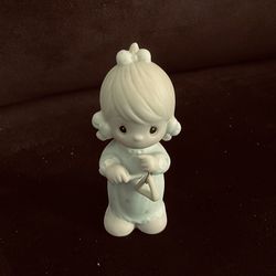 Adorable Mini Precious Moments figurine.  In perfect condition.    No box.