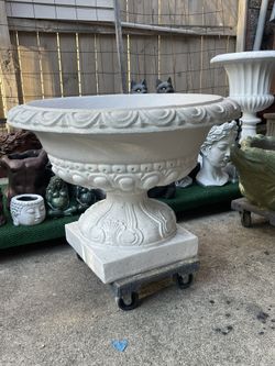 CONCRETE URN PLANTERS $200EACH