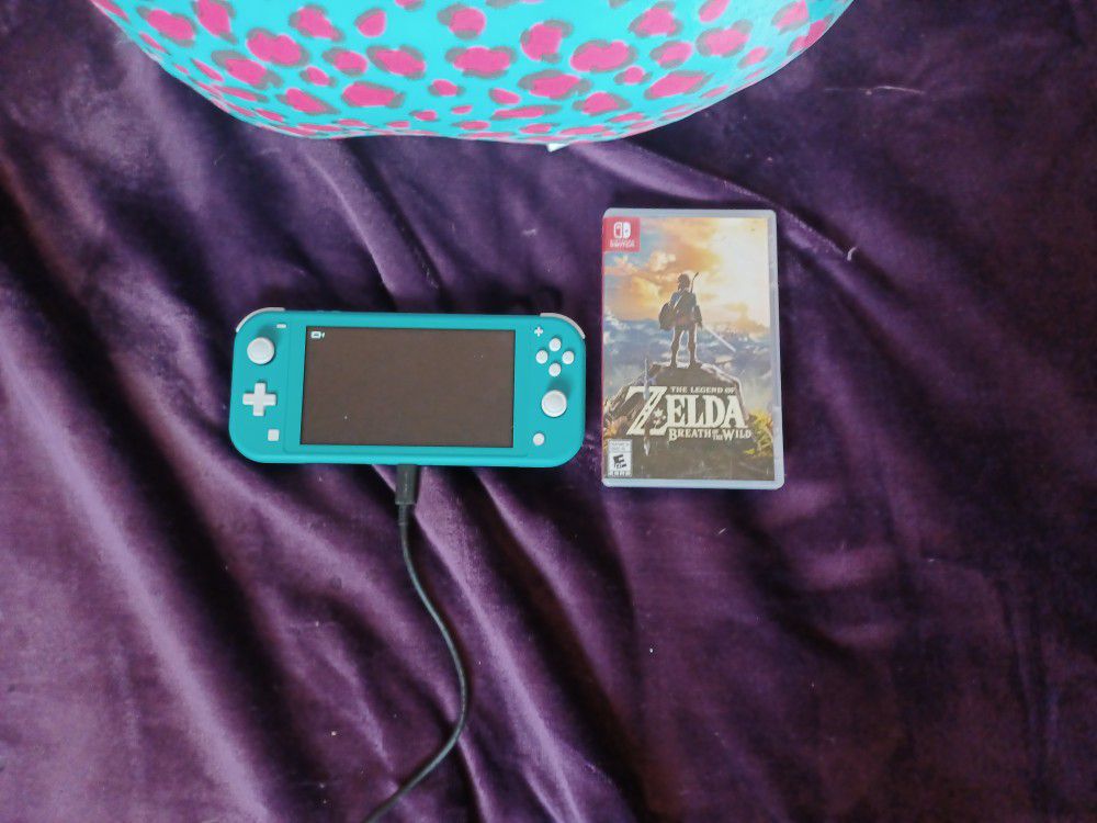 Switch Lite With Zelda Game --hardly Used