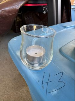 Votive holders with candles