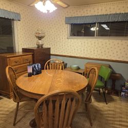 Round oak table and chairs $50