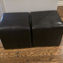 2 brown faux leather ottomans