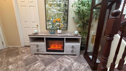 Beautiful fireplace /tv stand in excellent condition 64” inches long