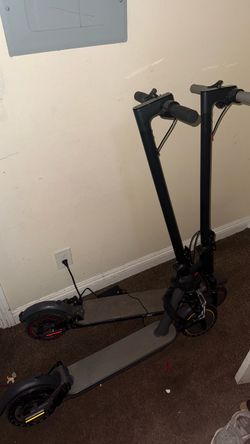 Two Black Electric Scooters