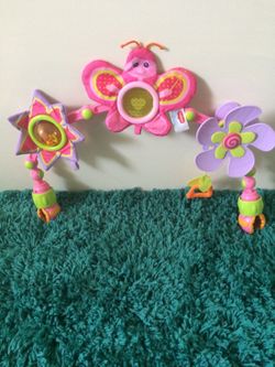 Clip on toy for car seat