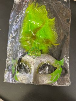 Green and silver glitter masquerade mask with feather