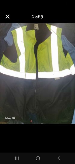 High visibility safety vest with reflective stripes.
