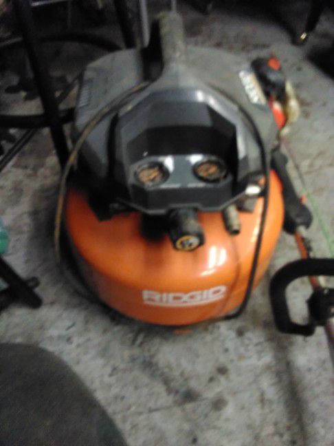 Ridgid Pancake Compressor And Chainsaw Echo And Echo Weed Eater