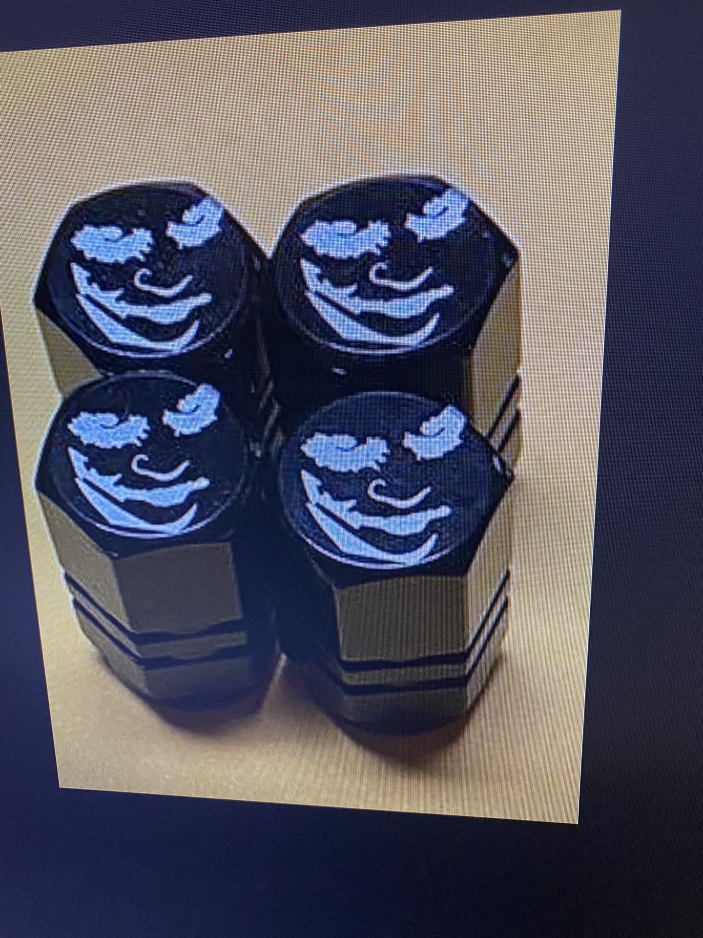 Joker tire valve stem caps four pack