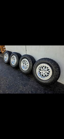 18" KMC  w/ 34" Falken Wildpeak RT tires