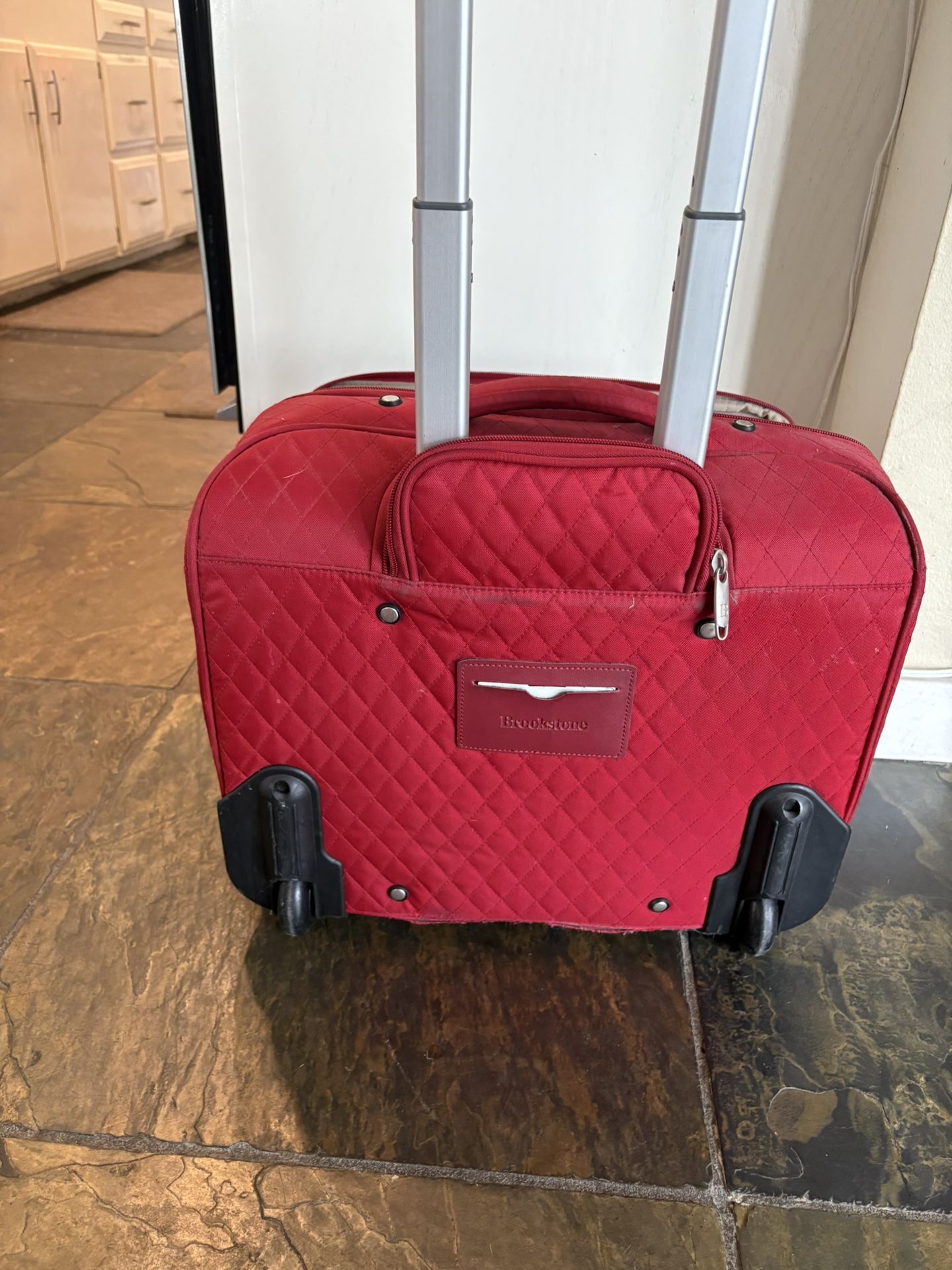 Brookstone Rolling luggage or Travel Bag
