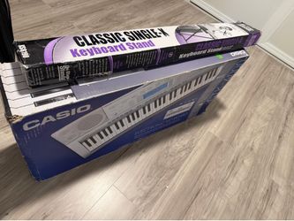Casio keyboard with stand…