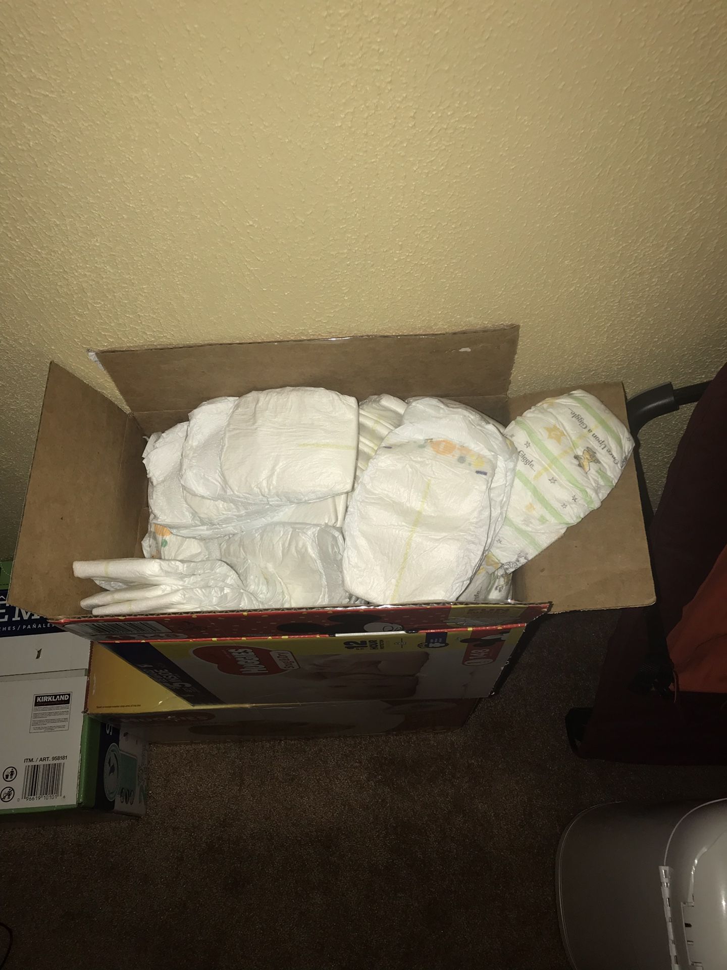 Huggies size 1 , supreme size 2 and, mix math of size 1 and 2