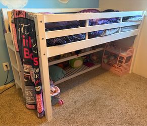 Cute white twin loft bed with shelves!