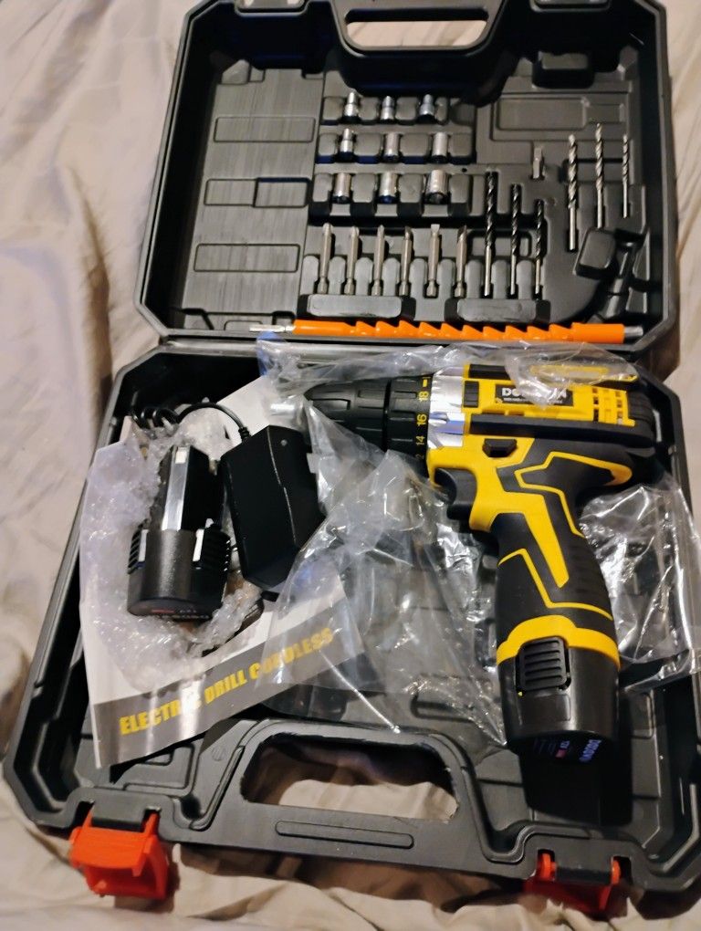 Cordless Drill With Attachments And 2 Batteries