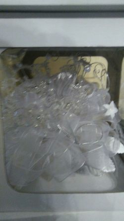 Brand New bouquets. Different colors, comes with head pieces.